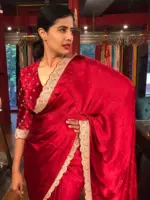 Dark Red Crepe Silk Saree highlighted with Hand Embroidery