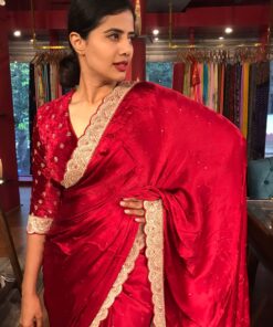 Dark Red Crepe Silk Saree highlighted with Hand Embroidery