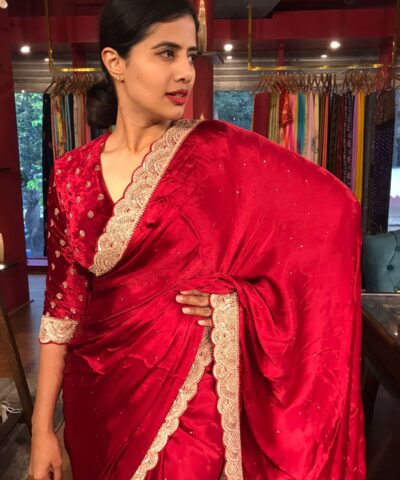 Dark Red Crepe Silk Saree highlighted with Hand Embroidery