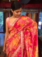 Pink Printed Tissue Georgette Silk Saree highlighted with Embroidered Border