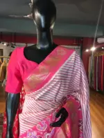 Offwhite Banarasi Soft Silk Saree highlighted with Patola Weaves