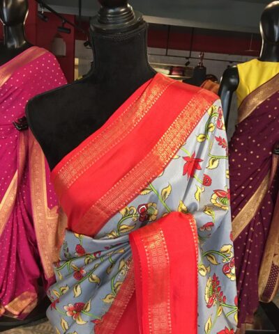 Blue Printed Banarasi Silk Saree highlighted with contrast border