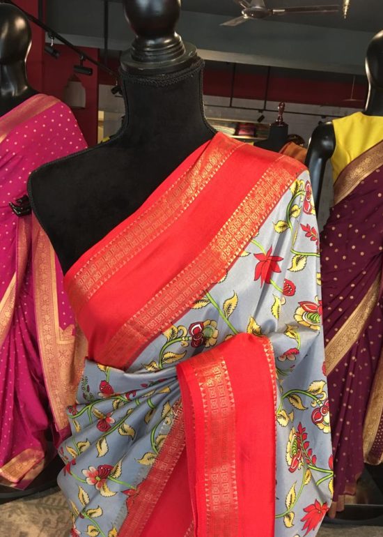 Blue Printed Banarasi Silk Saree highlighted with contrast border