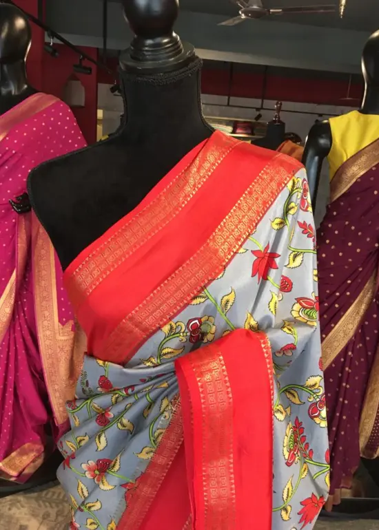 Blue Printed Banarasi Silk Saree highlighted with contrast border