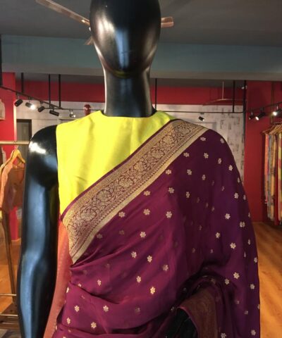 Wine Crepe Silk Saree with Beautiful Gold Zari Buttas highlighted with Gold Woven Border