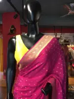Pink Crepe Silk Saree with Beautiful Gold Zari Buttas highlighted with Gold Woven Border