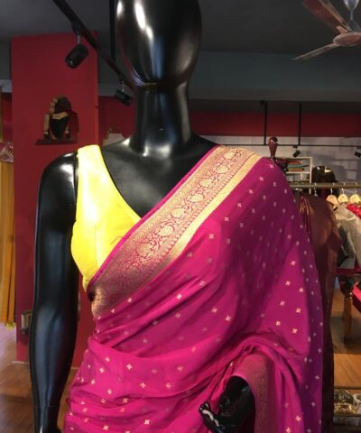 Pink Crepe Silk Saree with Beautiful Gold Zari Buttas highlighted with Gold Woven Border