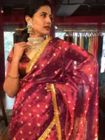 Maroon Dual Tissue Silk Saree highlighted with Zari Motifs and Gota Border