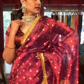 Maroon Dual Tissue Silk Saree highlighted with Zari Motifs and Gota Border