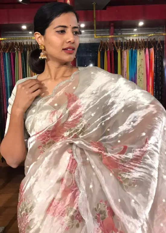 Silver Hand Embroidered and Hand painted Tissue Silk Saree highlighted with Scalloped Border