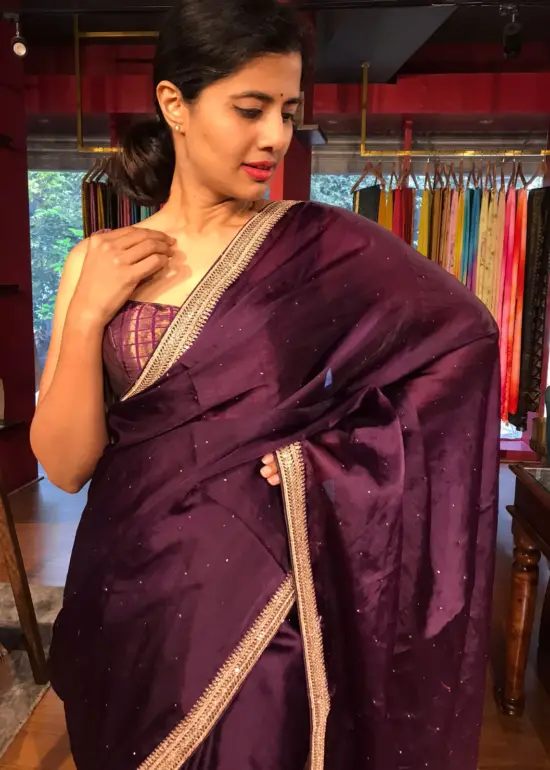 Purple Organza Silk Saree with beautiful hand embroidered border adorned with Badla work