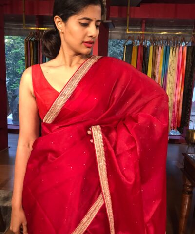 Scarlet Red Organza Silk Saree with beautiful hand embroidered border adorned with Badla work
