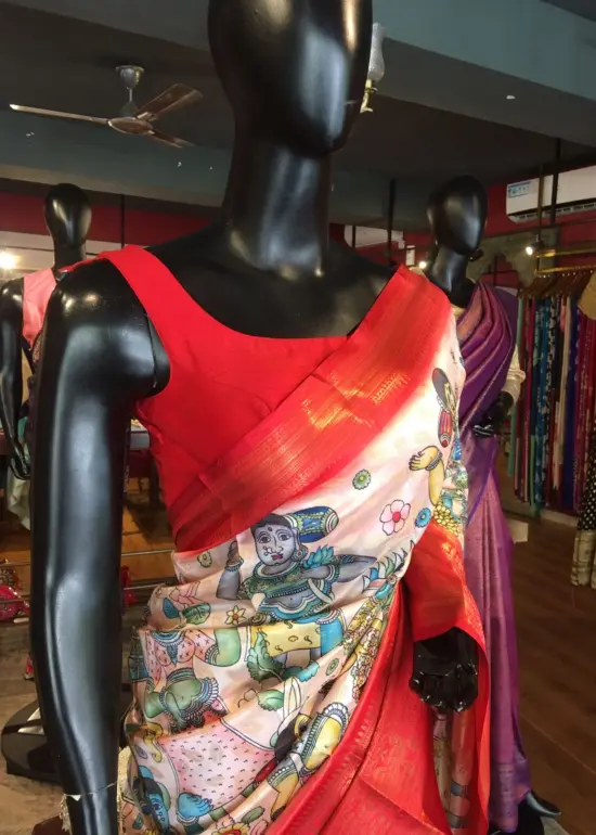 Ivory Banarasi Dupion Silk Saree highlighted with Kalamkari Prints and Silk Border