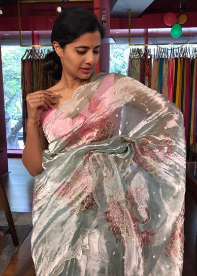 Blue Hand Embroidered and Hand painted Tissue Silk Saree highlighted with Scalloped Border