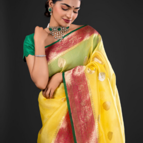 Yellow Pure Kora Organza Silk Saree woven with Kadhwa Zari Motifs highlighted with contrast zari border