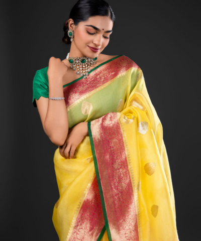 Yellow Pure Kora Organza Silk Saree woven with Kadhwa Zari Motifs highlighted with contrast zari border