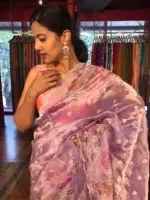 Purple Hand Embroidered and Hand painted Tissue Silk Saree highlighted with Scalloped Border