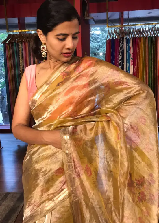 Yellow Floral Printed Tissue Silk Saree with Gold Zari Border