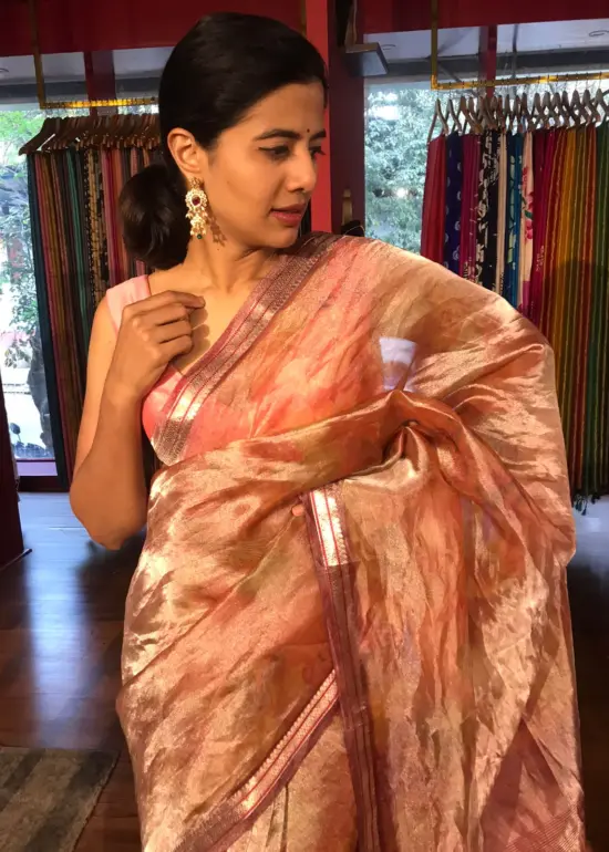 Peach Floral Printed Tissue Silk Saree with Gold Zari Border