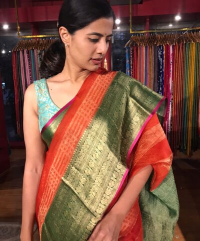 Tomato Red Organza Silk Saree highlighted with Kanchi Zari Border
