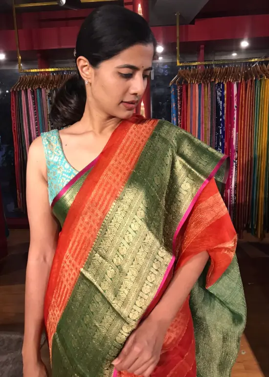 Tomato Red Organza Silk Saree highlighted with Kanchi Zari Border
