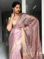 Onion Pink Tissue Silk Saree Embellished with Sequins highlighted with contrast Gold Zari Border