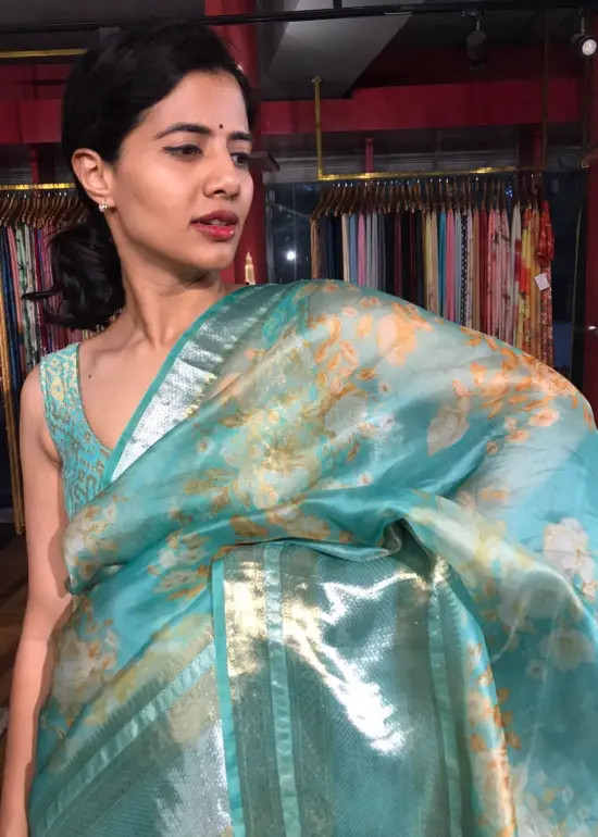 Teal Printed Organza Silk Saree with Kanchi Zari Border