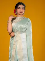 Sea Green Handloom Organza Silk Saree Highlighted with Kanchi Zari Border and Sequins Embroidery all over