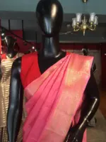 Pink Chiffon Silk Saree highlighted with Striped and Gold Zari Border