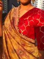 Mustard Yellow Printed Crushed Tissue Silk Saree highlighted with contrast embroidered detailing