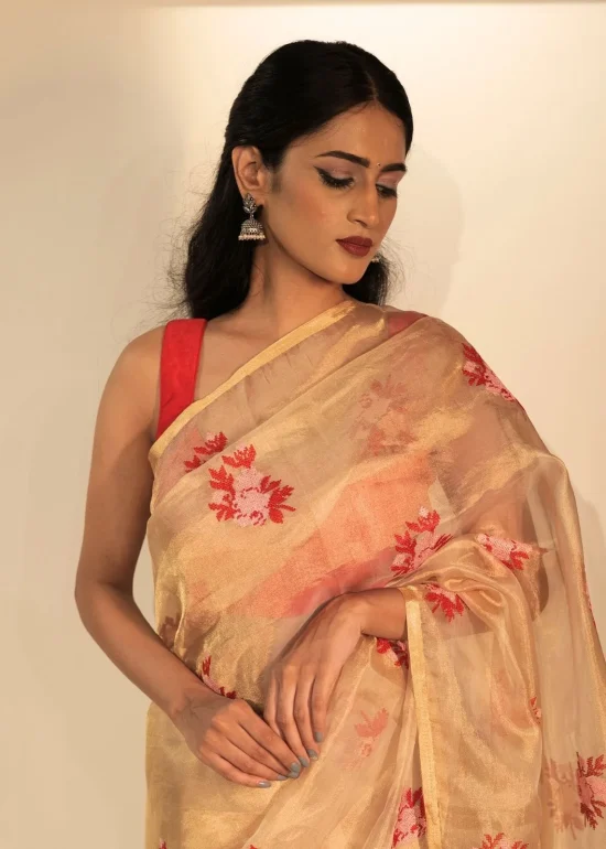 Gold Tissue Silk Saree highlighted with Beautiful cross stitch embroidery