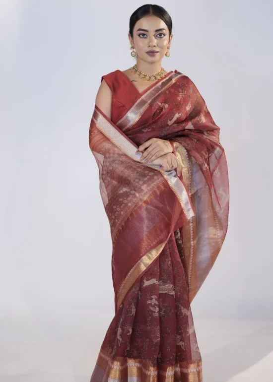 Maroon  Printed Organza Silk Saree highlighted with Kanchi Silk Zari Border