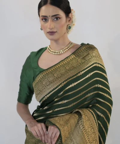 Bottle Green Georgette Silk Saree adorned with Antique Gold Border