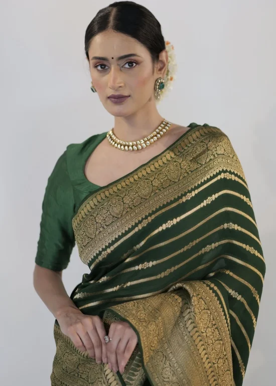 Bottle Green Georgette Silk Saree adorned with Antique Gold Border