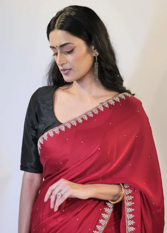 Red Crepe Silk Saree embellished with Stones