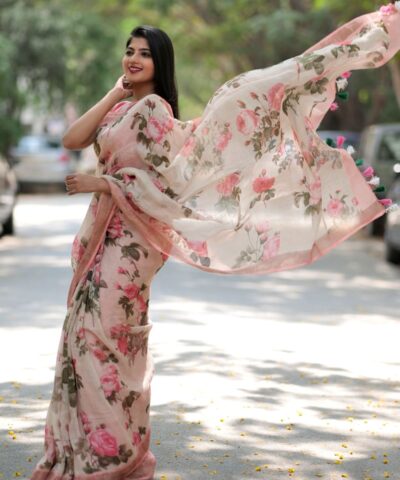 Ivory Printed Linen Saree adorned with Zari and contrast pink piping