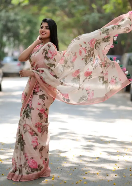 Ivory Printed Linen Saree adorned with Zari and contrast pink piping