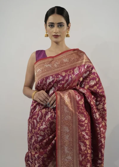 Wine Banarasi Silk Saree highlighted with Gold Zari Weaves