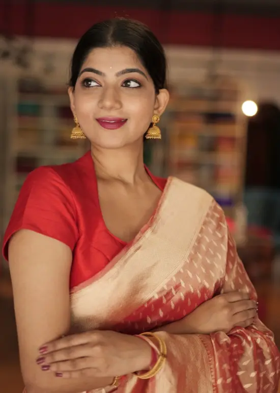 Wine Banarasi Silk Saree highlighted with Gold Zari Weaves