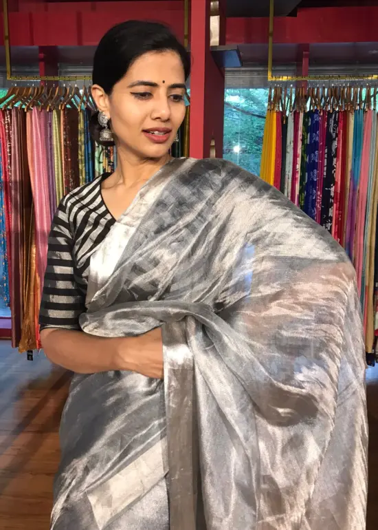 Ice Blue Tussar tissue silk saree with Beautiful Zari border