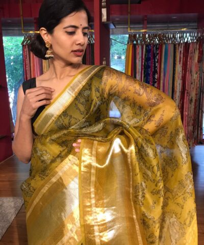 Yellow Printed Organza Silk Saree highlighted with Kanchi Silk Zari Weaves
