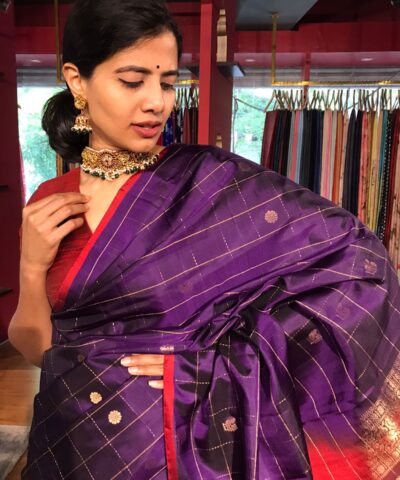Purple Kanchivaram Silk Saree highlighted with Gold Zari Peacock  Motifs