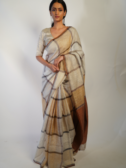 Elegant Off white Linen saree by Mirra Clothing