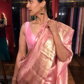 Pink Tissue Silk Saree highlighted with Zari Border
