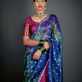 "Close up view of a model showcasing Magenta Silk Half Saree Set with Tissue Silk Dupatta , Suitable for grand occasions "By Mirra Clothing