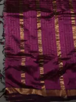 "Close up view of a model showcasing Magenta Handwoven Mangalagiri Silk Saree, Suitable For Engagement or Sangeet Functions By Mirra Clothing