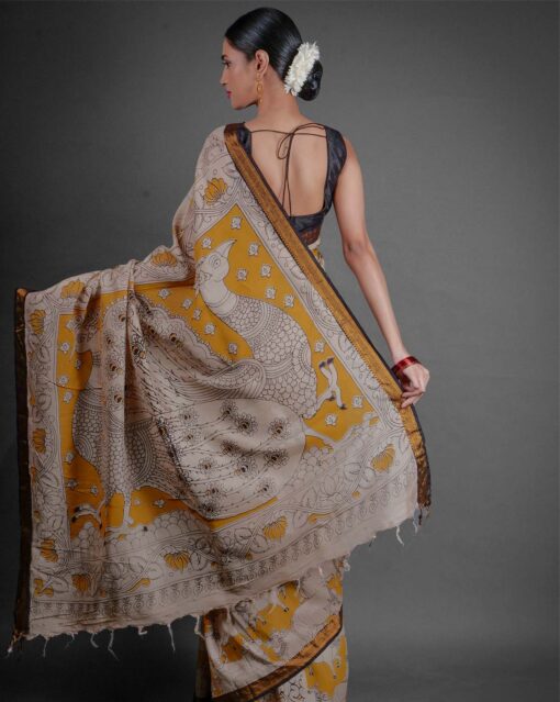 Back view of a model showcasing Yellow Kalamkari Printed Mangalagiri Silk Saree, Suitable for Weddings By Mirra Clothing