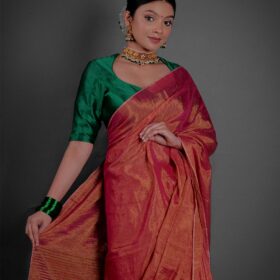 Close up view of a model showcasing Ombre Red Tissue Linen Saree , Suitable for social events By Mirra Clothing