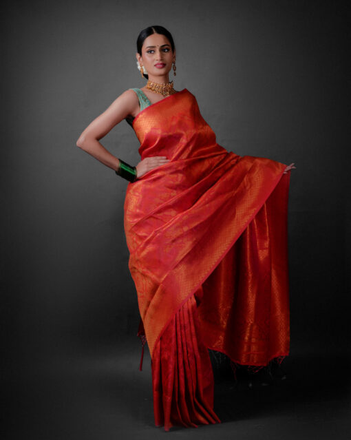 Side view of a model showcasing Pink Banarasi Silk Saree with Zari Weaves , Perfect for an ethnic or vintage-themed gathering By Mirra Clothing