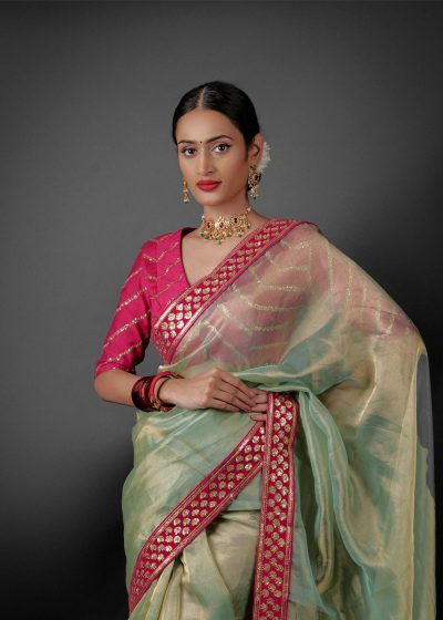 Sea Green Tissue Silk Saree highlighted with sequins Embroidered